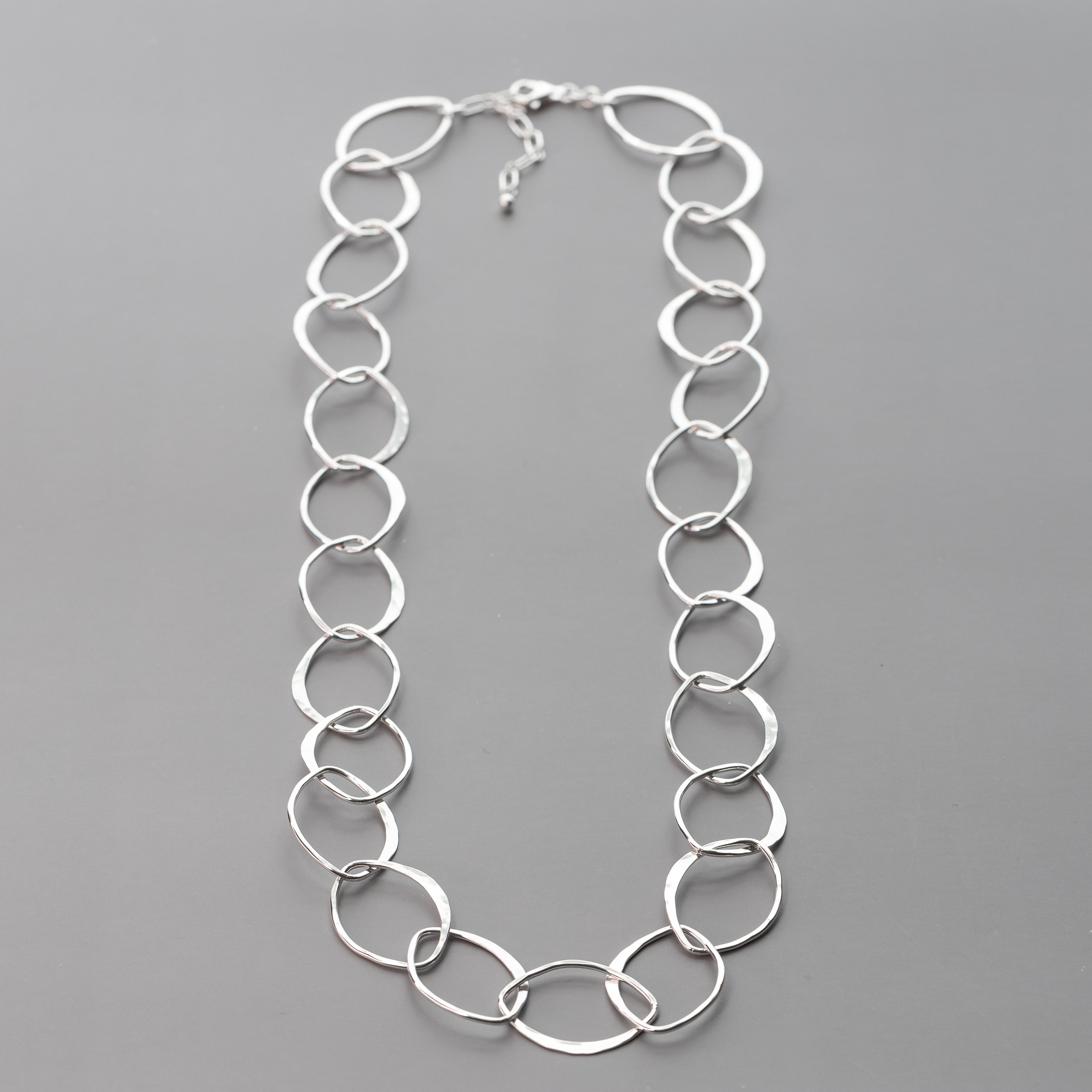 Handmade Sterling Silver Statement necklace is crafted with solid Argentium Sterling Silver. Artisan hand hammered details on the sterling silver reflect the light beautifully from every angle.