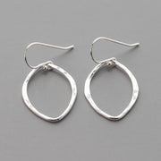 These handmade Sterling Silver Drop Earrings are hand hammered for texture and polished to a high shine.  Artisan sterling silver jewelry handcrafted with Argentium Sterling Silver 