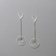 Long Silver Earrings handmade with solid sterling silver.  Nickel free leverback statement earrings with hammered circles.  Handmade artisan silver jewelry