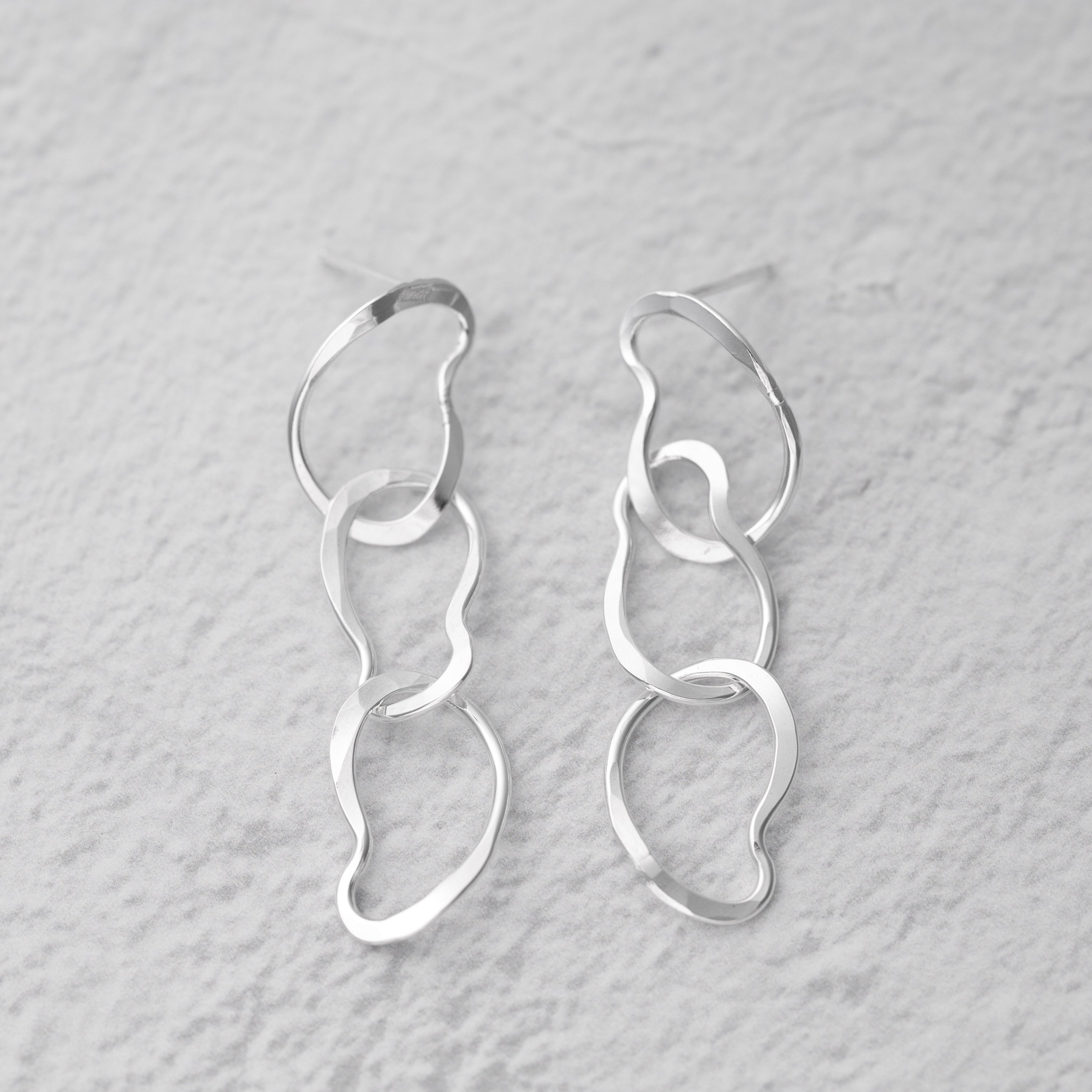 handmade sterling silver earrings with nickel free posts.  Unique dangle drop earrings with artisan hammered details.  Argentium Sterling Silver Jewelry