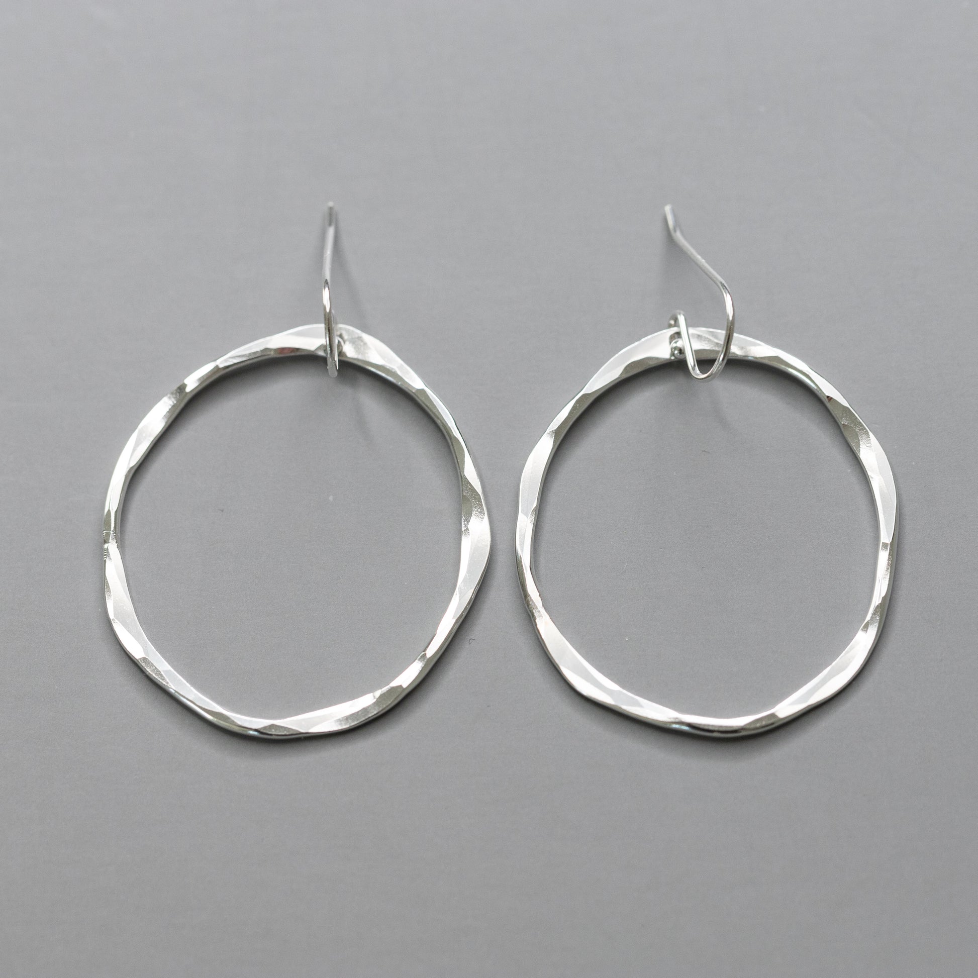 handmade sterling silver dangle drop earrings with hammered texture