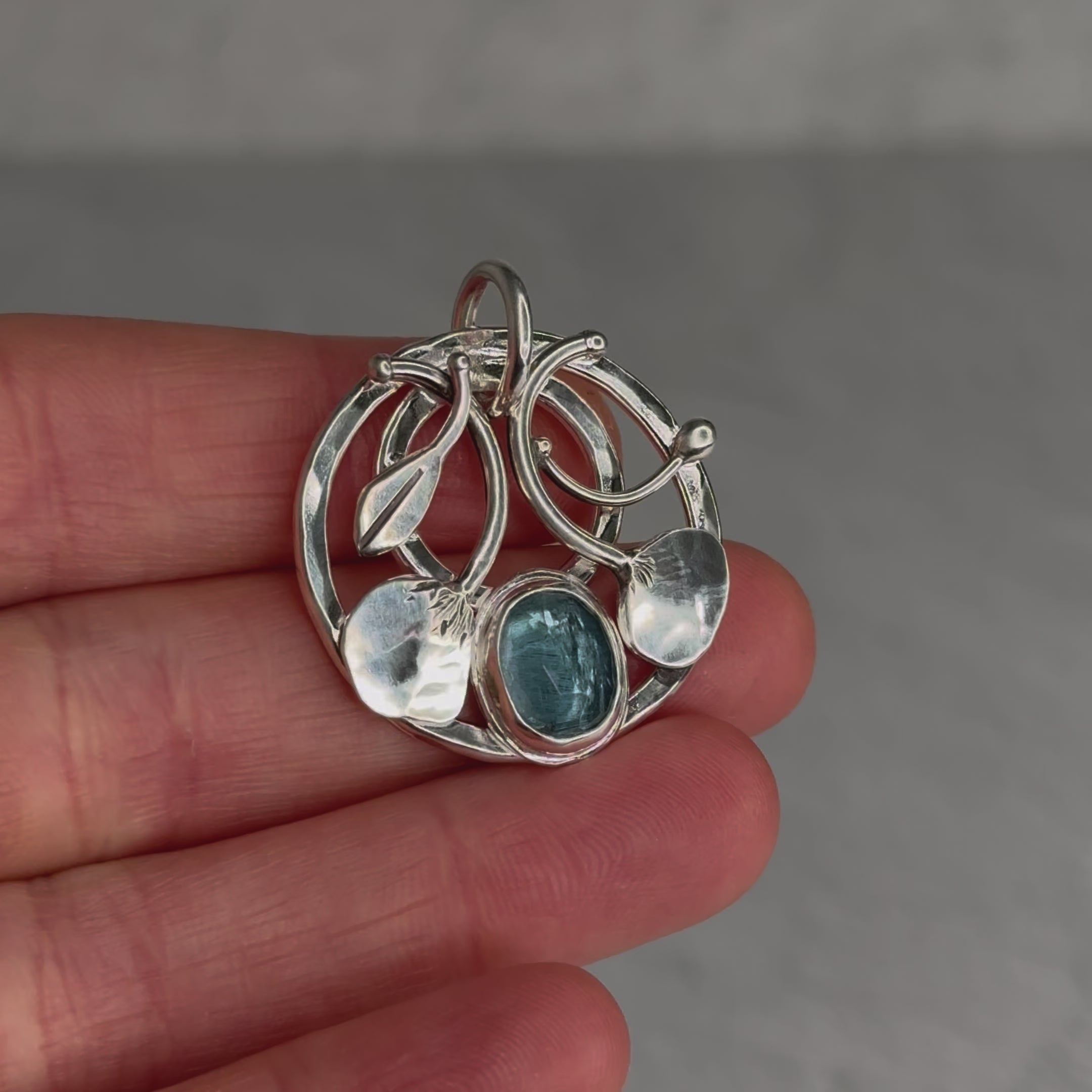 Load video: Kyanite and Hammered Sterling Silver Vine Pendant